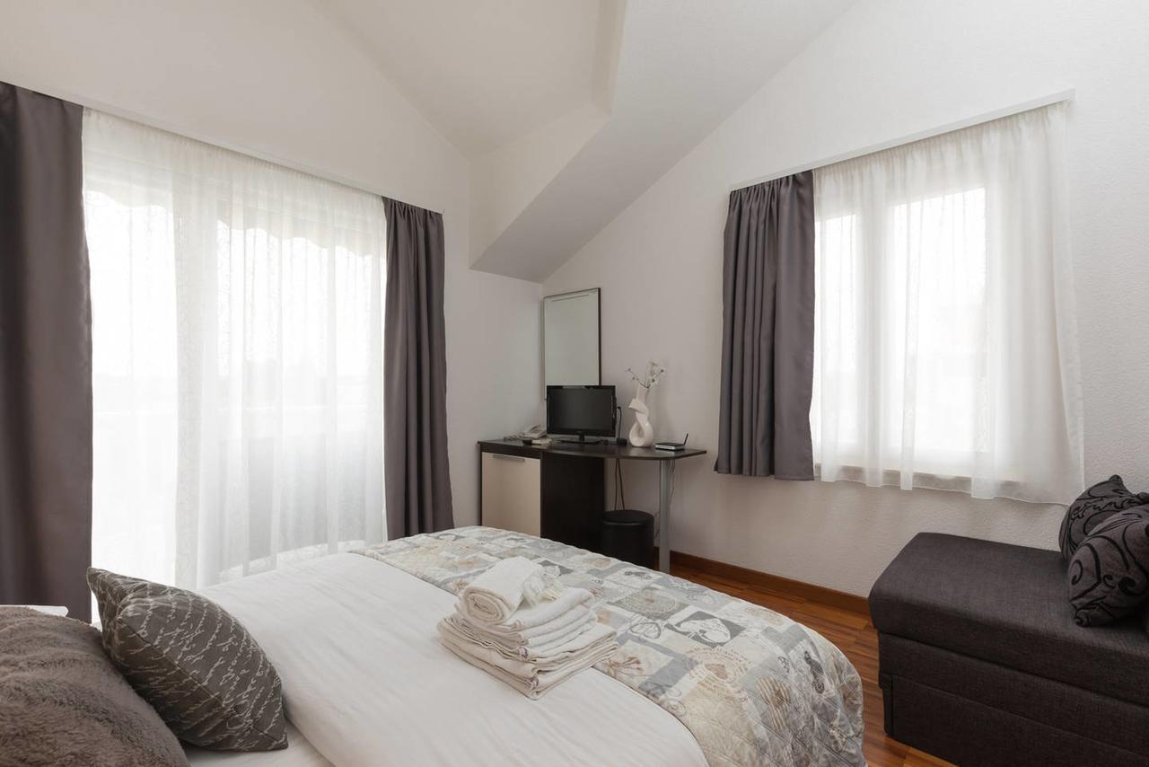 Apartments & Rooms Villa Maslina Trogir Buitenkant foto